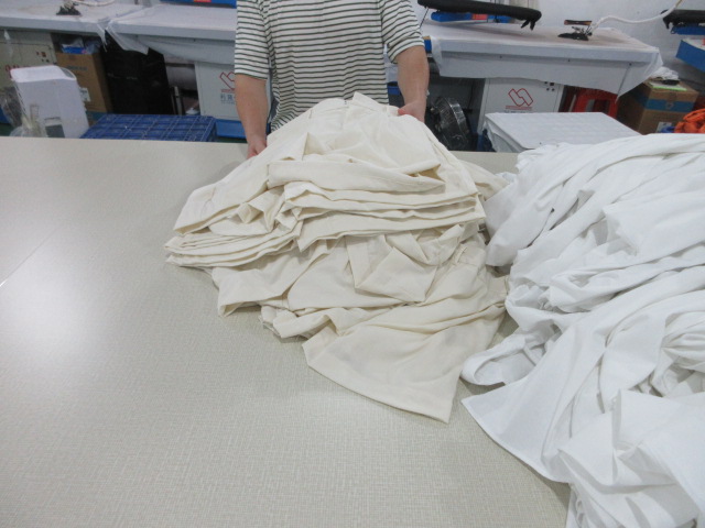 Garment packaging and shipment preparation at Jedia Clothing