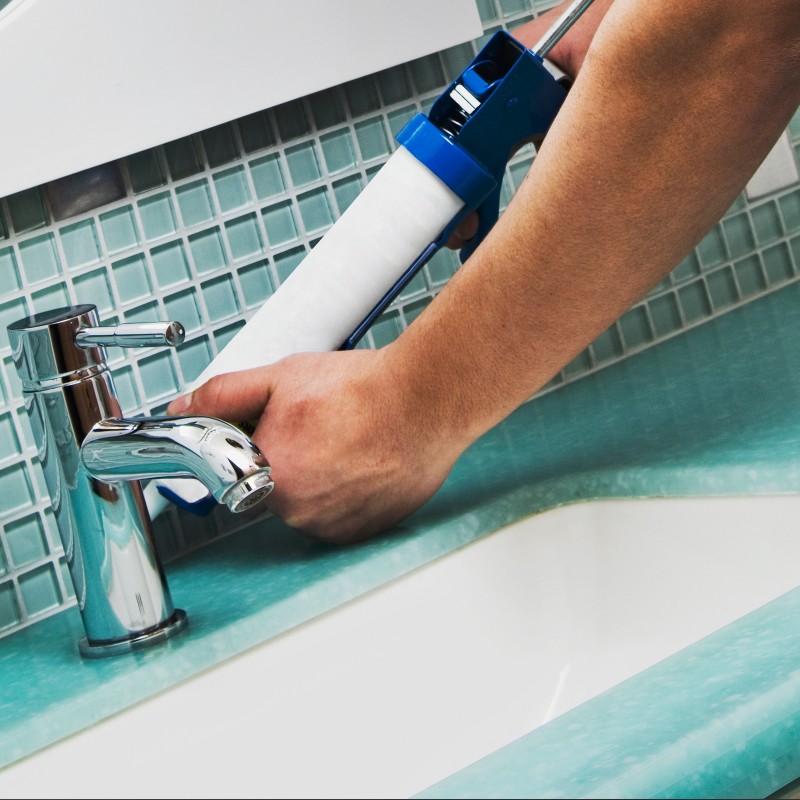 Silicone sealant application on bathroom tile and sanitary ware joints