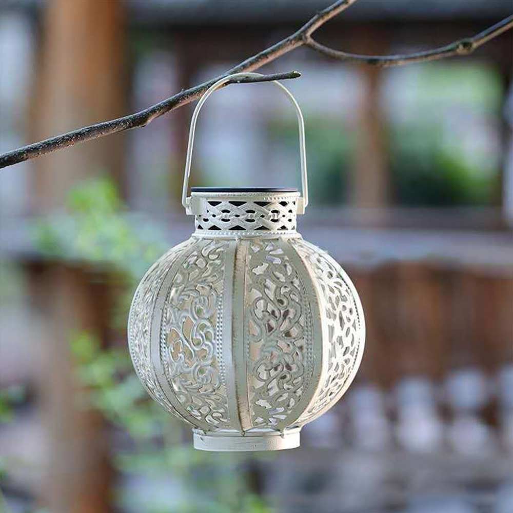 White lantern garden light solar top panel