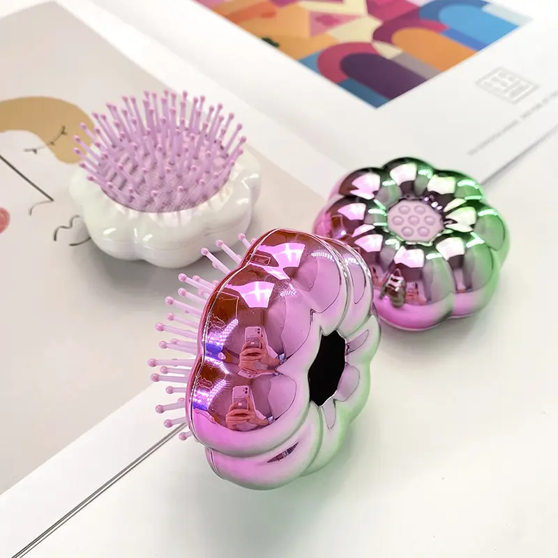 ODM Scaleable folding flower electroplating portable massage hairbrush Manufacturer, Manufacturers