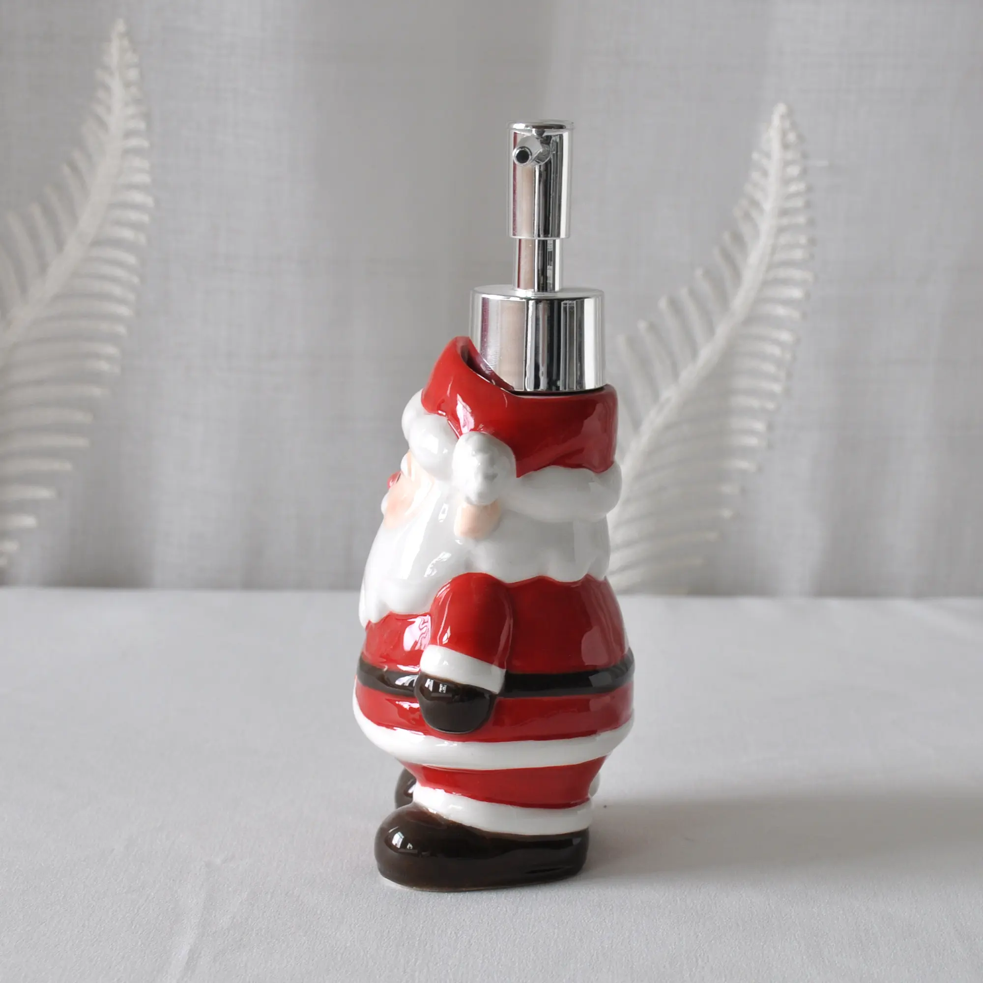China Christmas Cute Santa Claus Ceramic Lotion Dispenser Exporter, Exporters