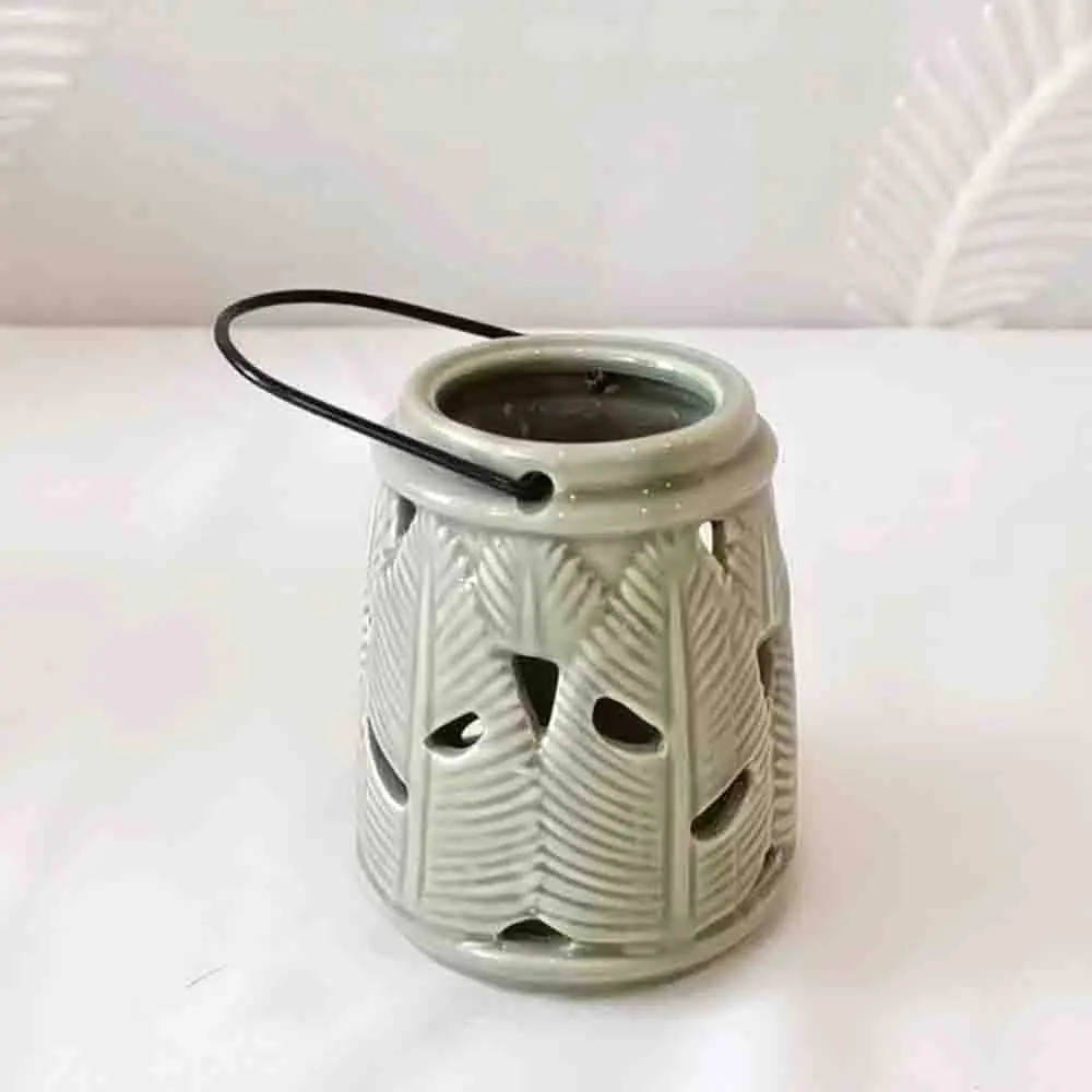 China Artistic Celadon Leaf Vein Cutout Ceramic Candle Holders with Handles Manufacturer, Exporter
