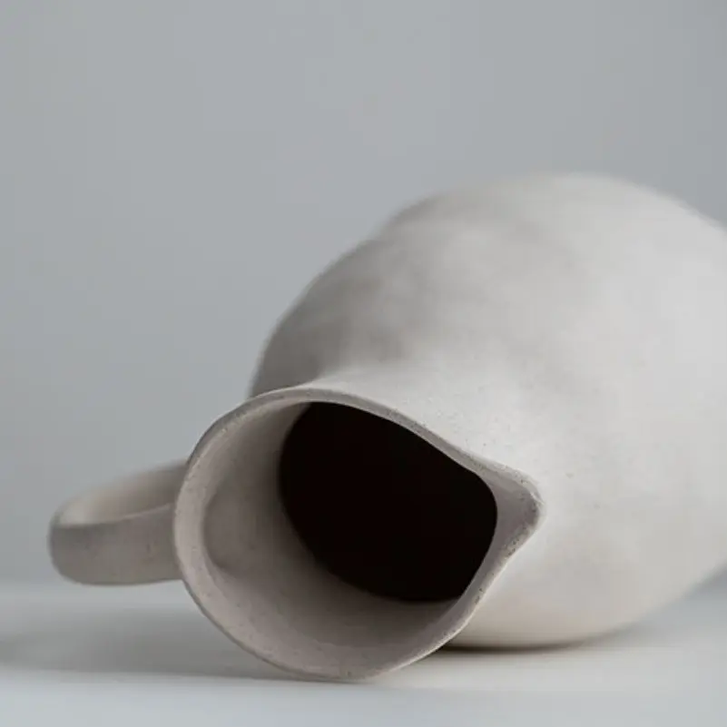 OEM Minimalist Pure White Single-Handled Jug-Shaped Ceramic Vase Manufacturers, Companies