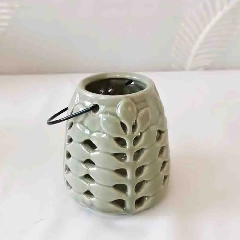 China Artistic Celadon Leaf Vein Cutout Ceramic Candle Holders with Handles Manufacturer, Exporter