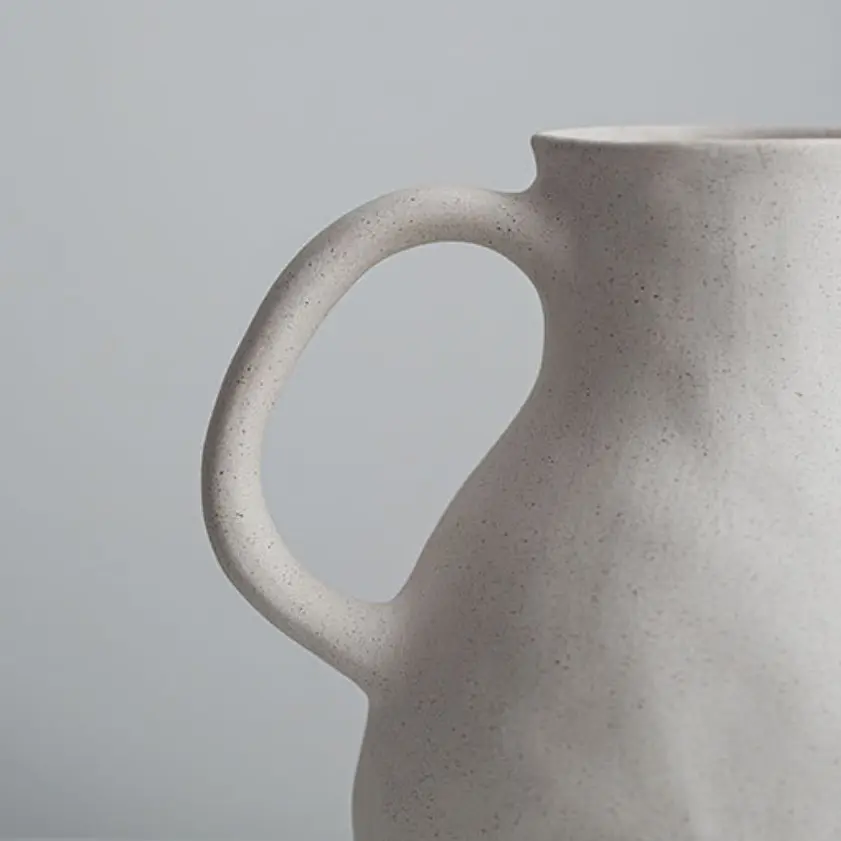 OEM Minimalist Pure White Single-Handled Jug-Shaped Ceramic Vase Manufacturers, Companies