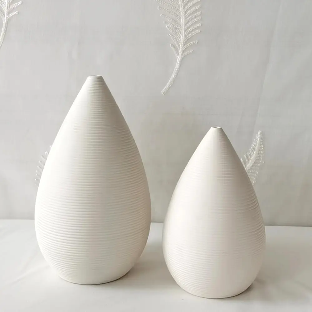 China Minimalist White Ceramic Vertical Striped Teardrop Vase Set Exporter, Company