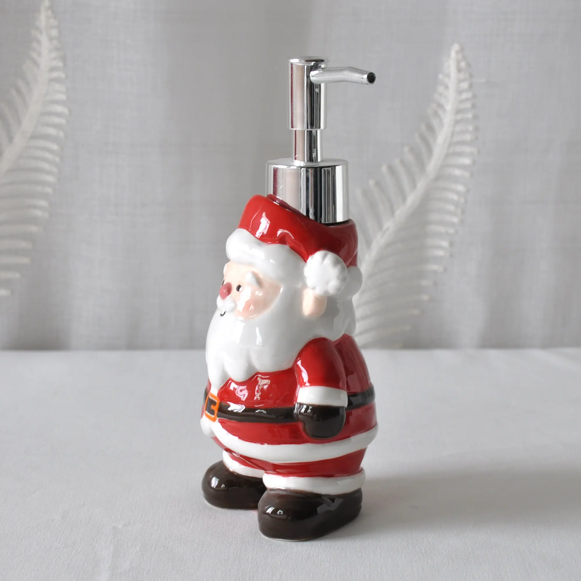 China Christmas Cute Santa Claus Ceramic Lotion Dispenser Exporter, Exporters