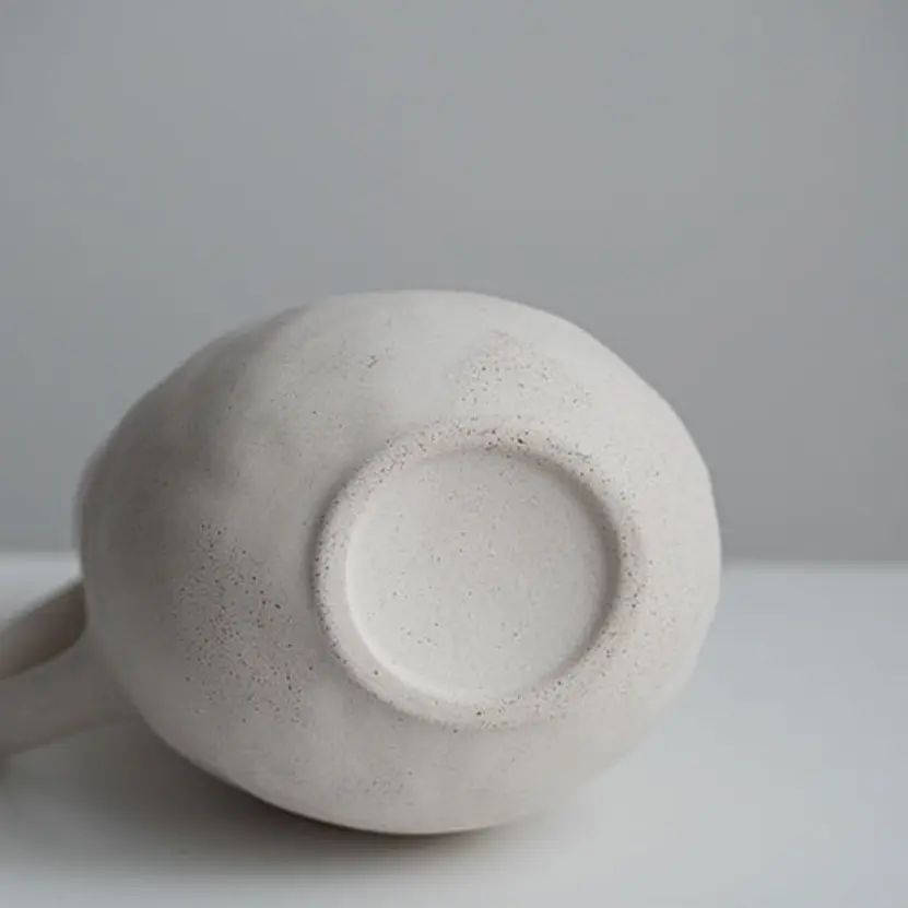 OEM Minimalist Pure White Single-Handled Jug-Shaped Ceramic Vase Manufacturers, Companies