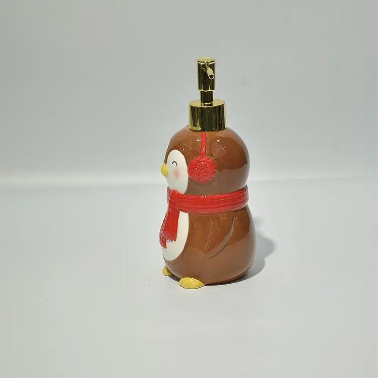 China Christmas Brown Penguin with Red Scarf & Earmuffs Dolomite Lotion Dispenser Exporter, Exporters