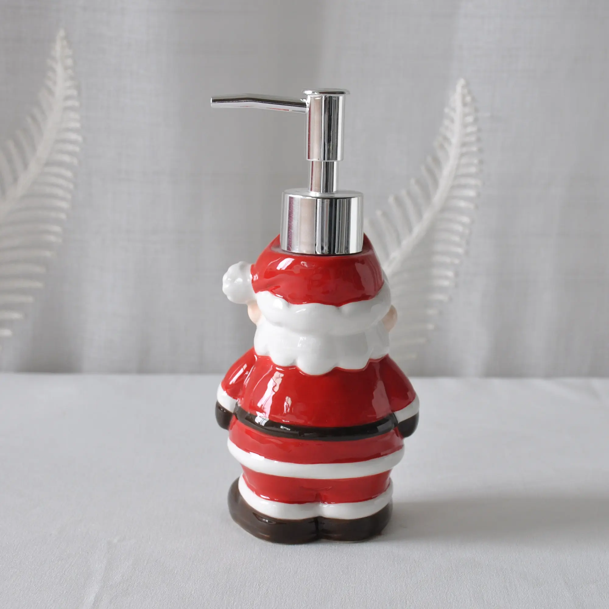 China Christmas Cute Santa Claus Ceramic Lotion Dispenser Exporter, Exporters
