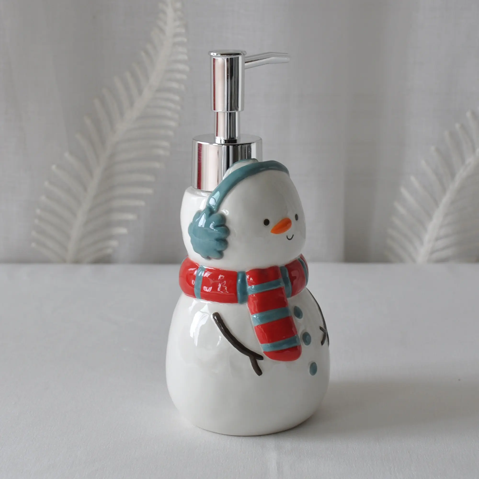 jiashun Christmas Snowman Ceramic Lotion Dispenser with Ear Muffs & Striped Scarf Exporters, Company
