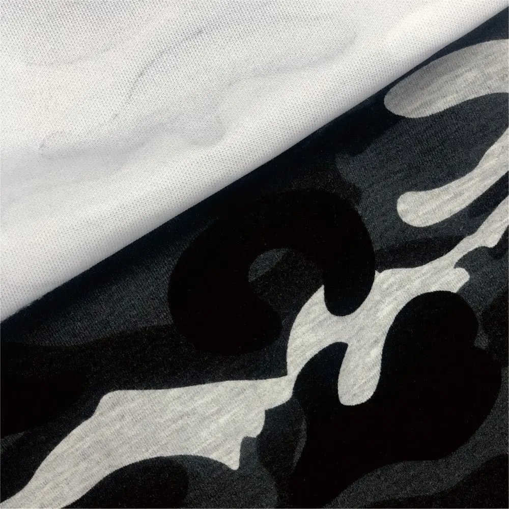 Scuba fabric close-up texture showing smooth double-knit construction for fashion garments