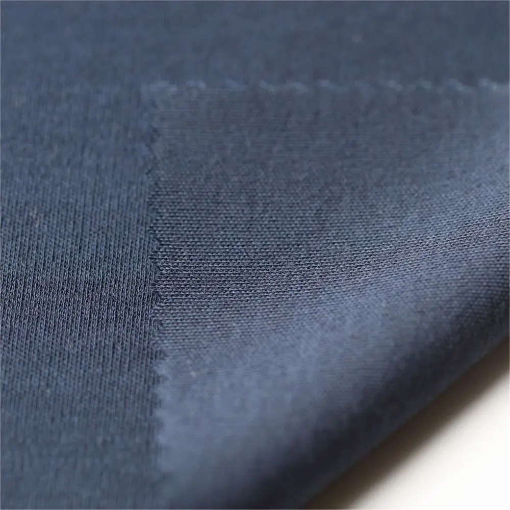 Interlock knit fabric texture showing tight double-layered construction for premium apparel
