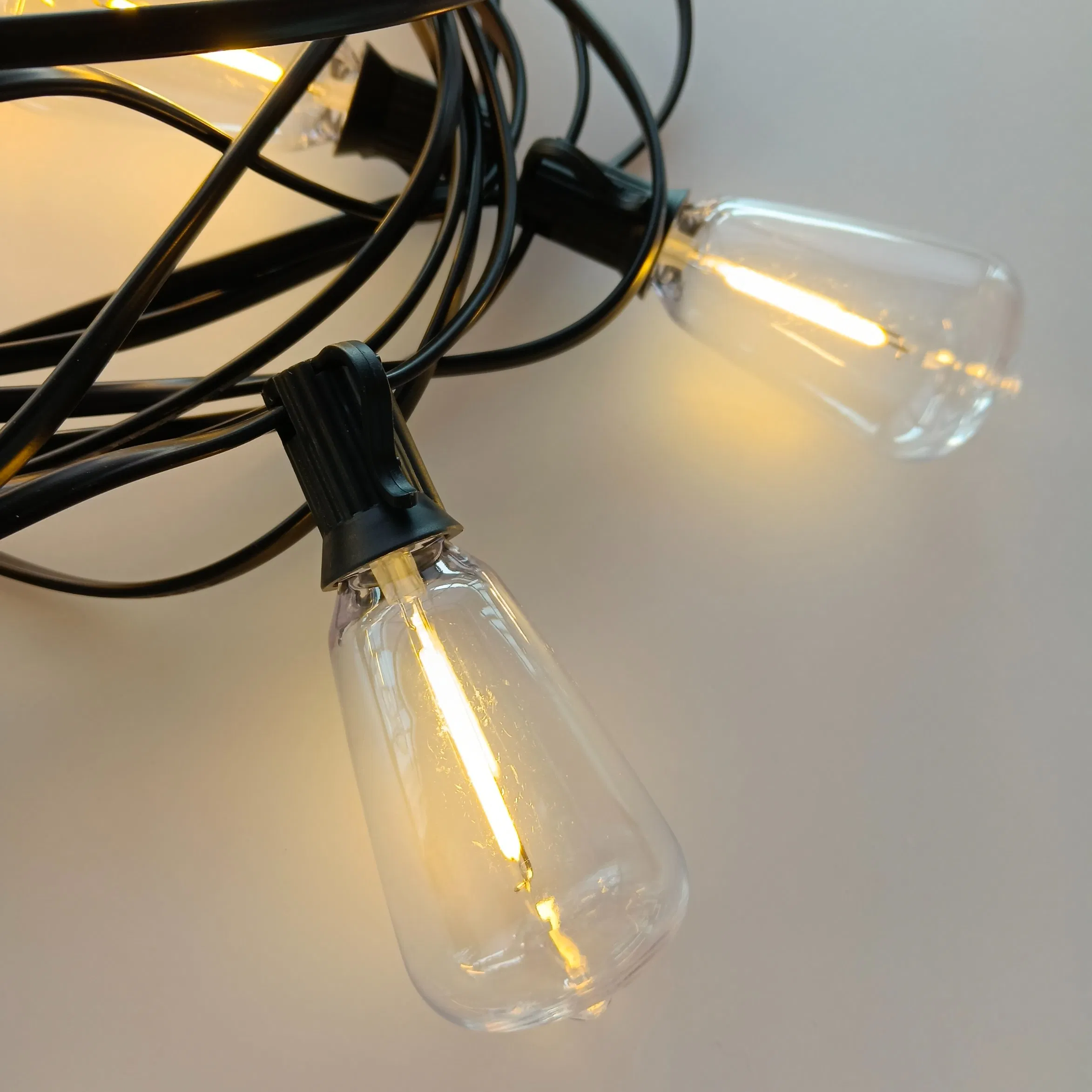 IP65 إضاءة فستون LED دافئة بيضاء لحفلات الدرجة التجارية في الهواء الطلق St38 أضواء خيطية للحديقة والشرفة والمناسبات والأعراس