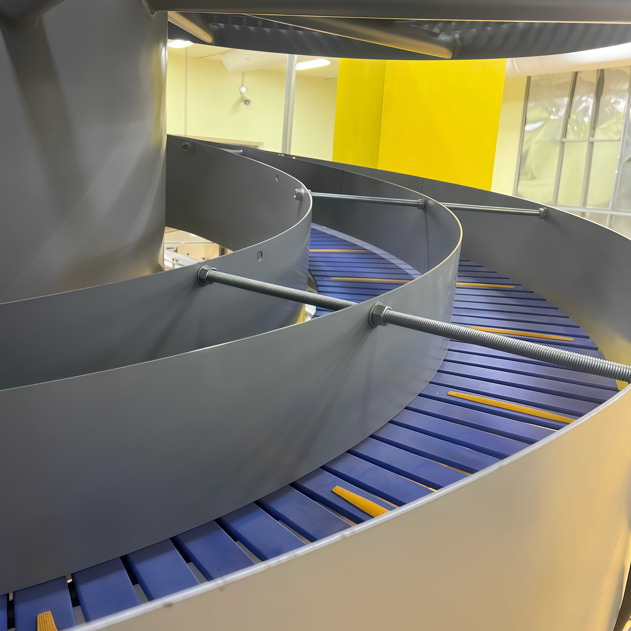 Modular Spiral Conveyor System for Efficient Vertical Material Flow in Warehouse and Processing Facilities