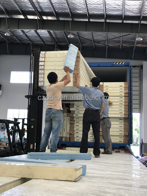 Panels loaded inside shipping container
