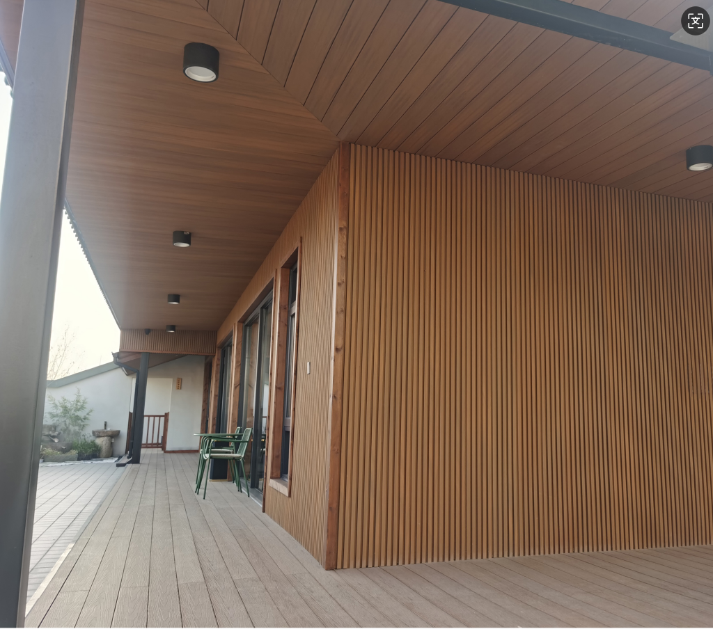 Wide 4-Strip Teak with Black Gap Composite Siding Panels