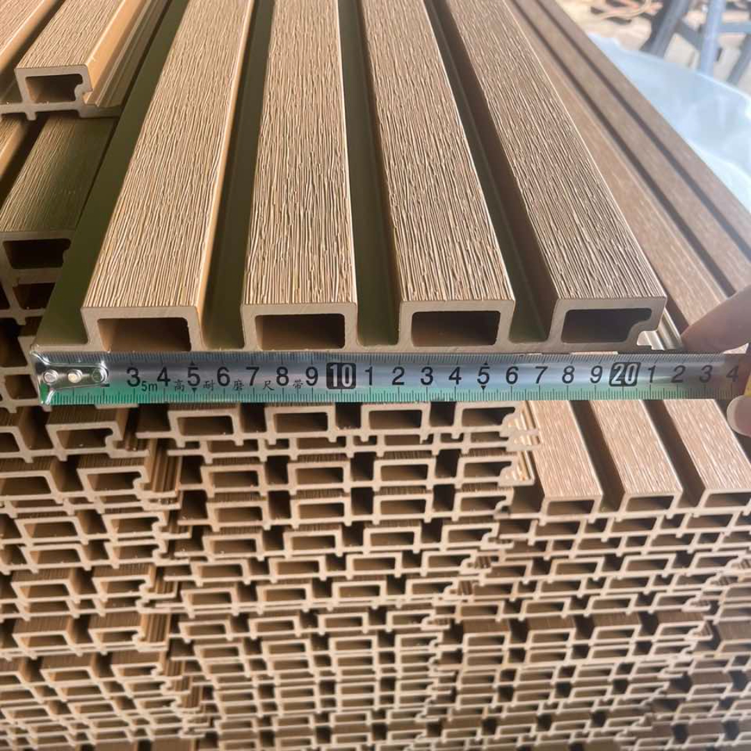 Second generation co-extruded WPC