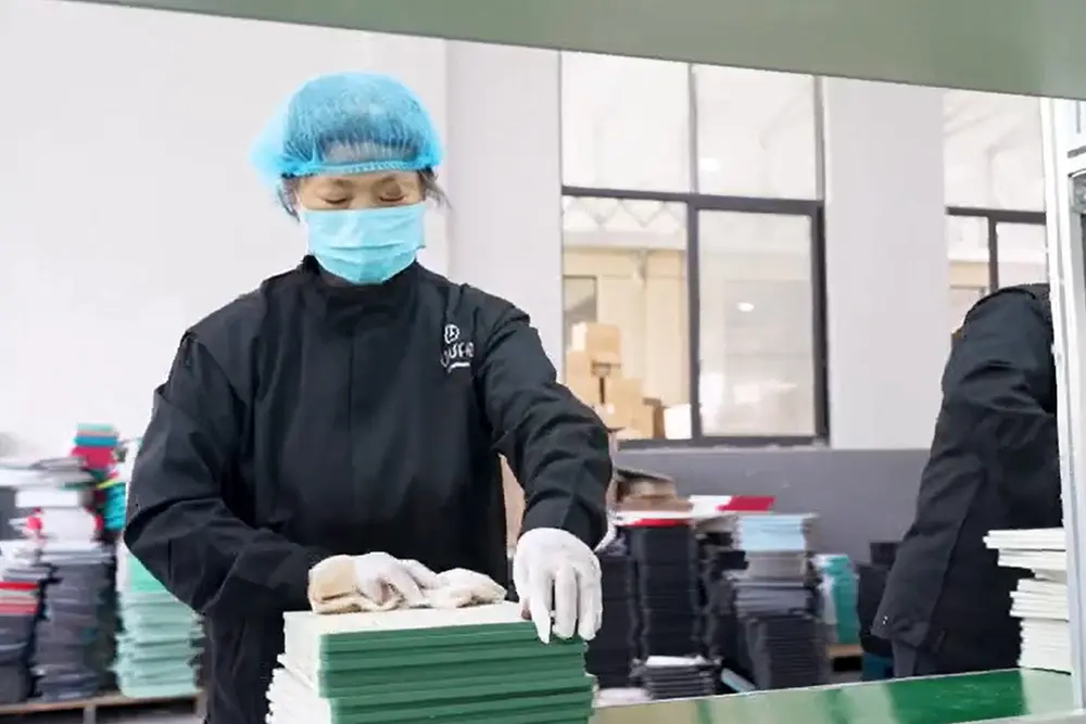 Step 6: Cleaning — product surface wiped with cloth to remove dust and residues