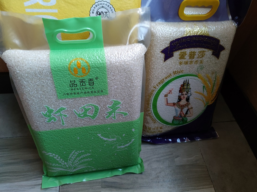 High-Efficiency Fully Automatic Electric 2.5-10 kg Rice &amp; Grain Vacuum Packaging Machine with PLC Control Energy Saving