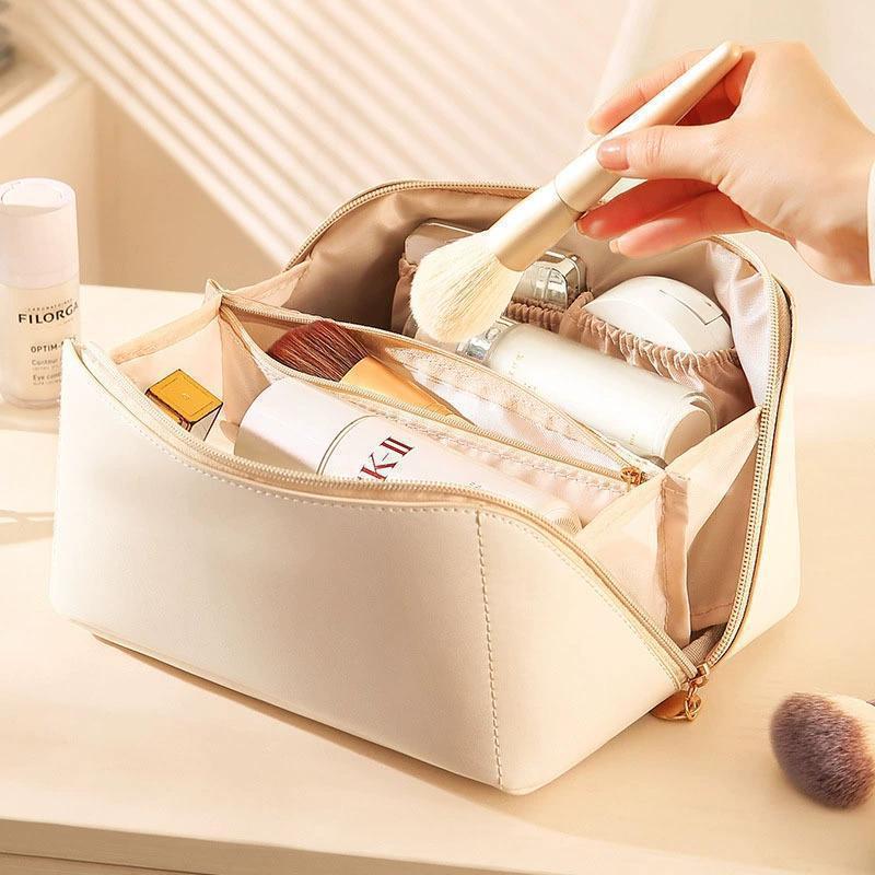 Wholesale Fashion Waterproof Toiletries Travel Custom Logo Large Capacity PU Pillow Leather Makeup Cosmetic Bag Zipper