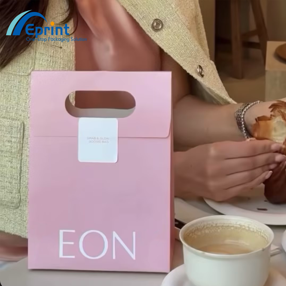Luxury Custom Logo Fashion Die-Cut Handles Shopping Paper Bags With Sticker Pink Die Cut Handle Make Up Jewelry Packaging