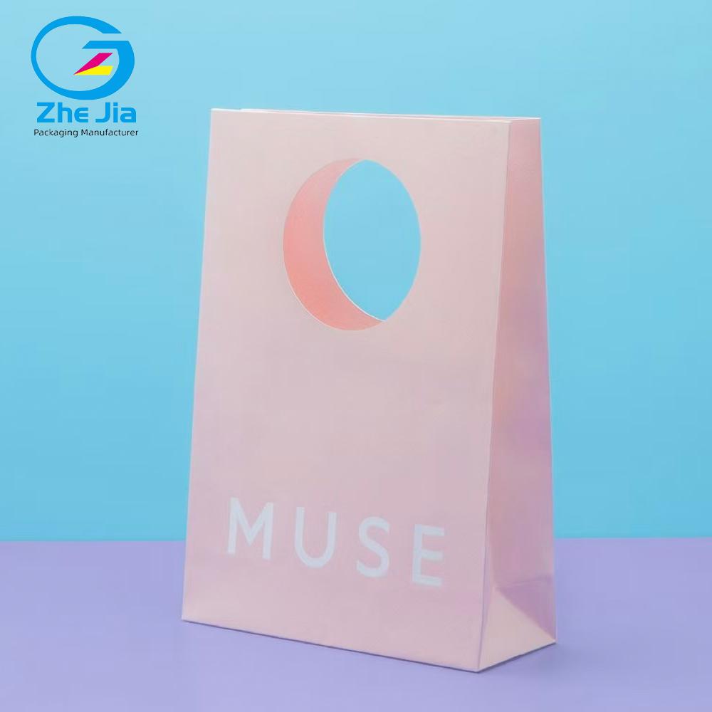 Luxury Custom Logo Fashion Die-Cut Handles Shopping Paper Bags Pink Die Cut Handle Make Up Printing Paper Bags Jewelry Packaging