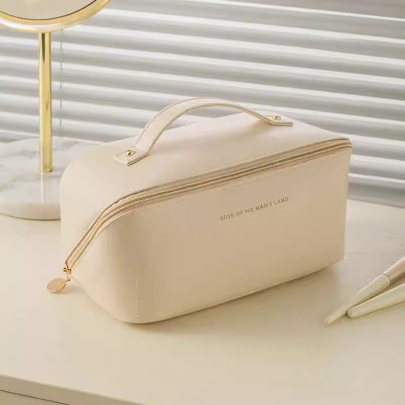 Wholesale Fashion Waterproof Toiletries Travel Custom Logo Large Capacity PU Pillow Leather Makeup Cosmetic Bag Zipper