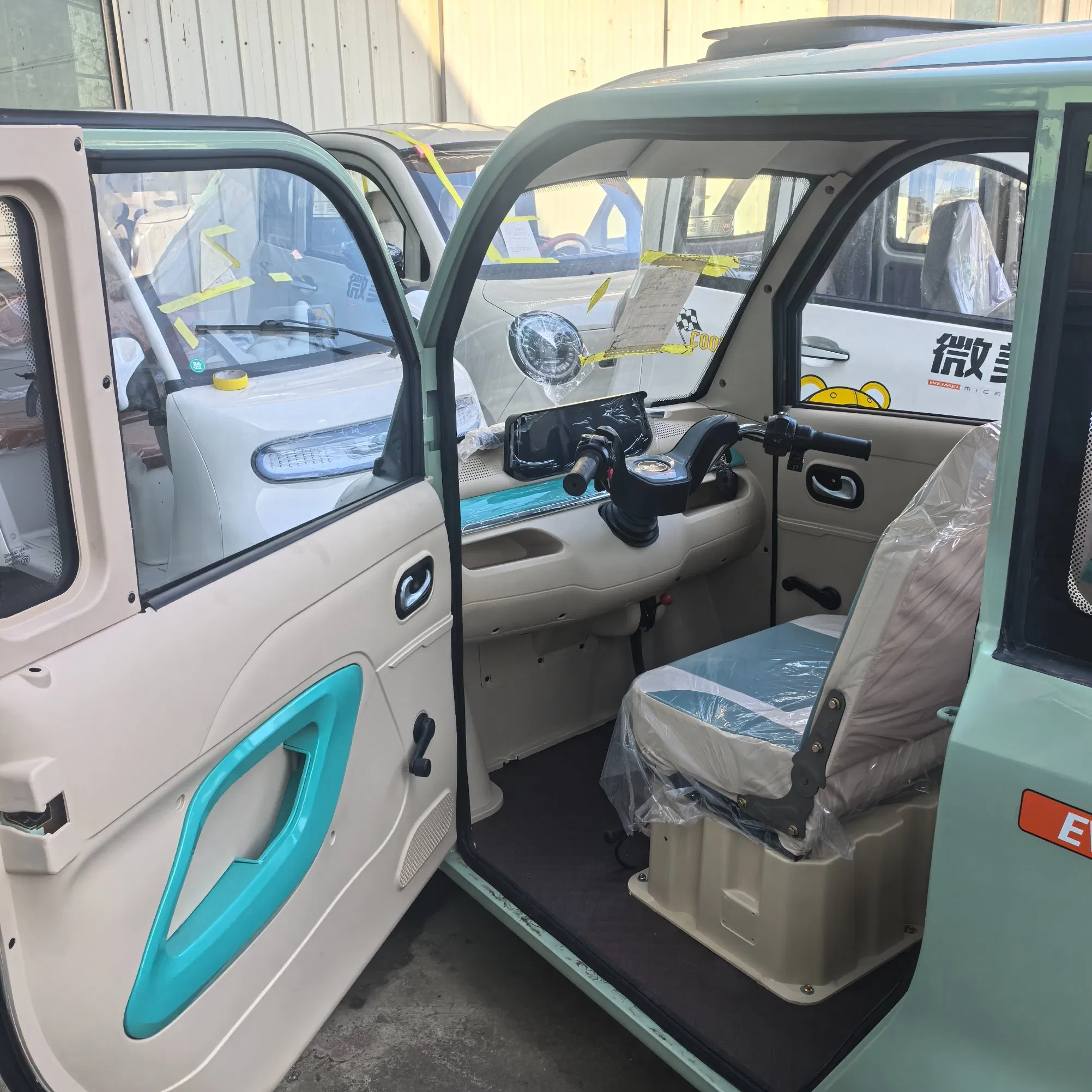 Smart Neighborhood Electric Vehicle with Auto Wiper and Reverse Camera