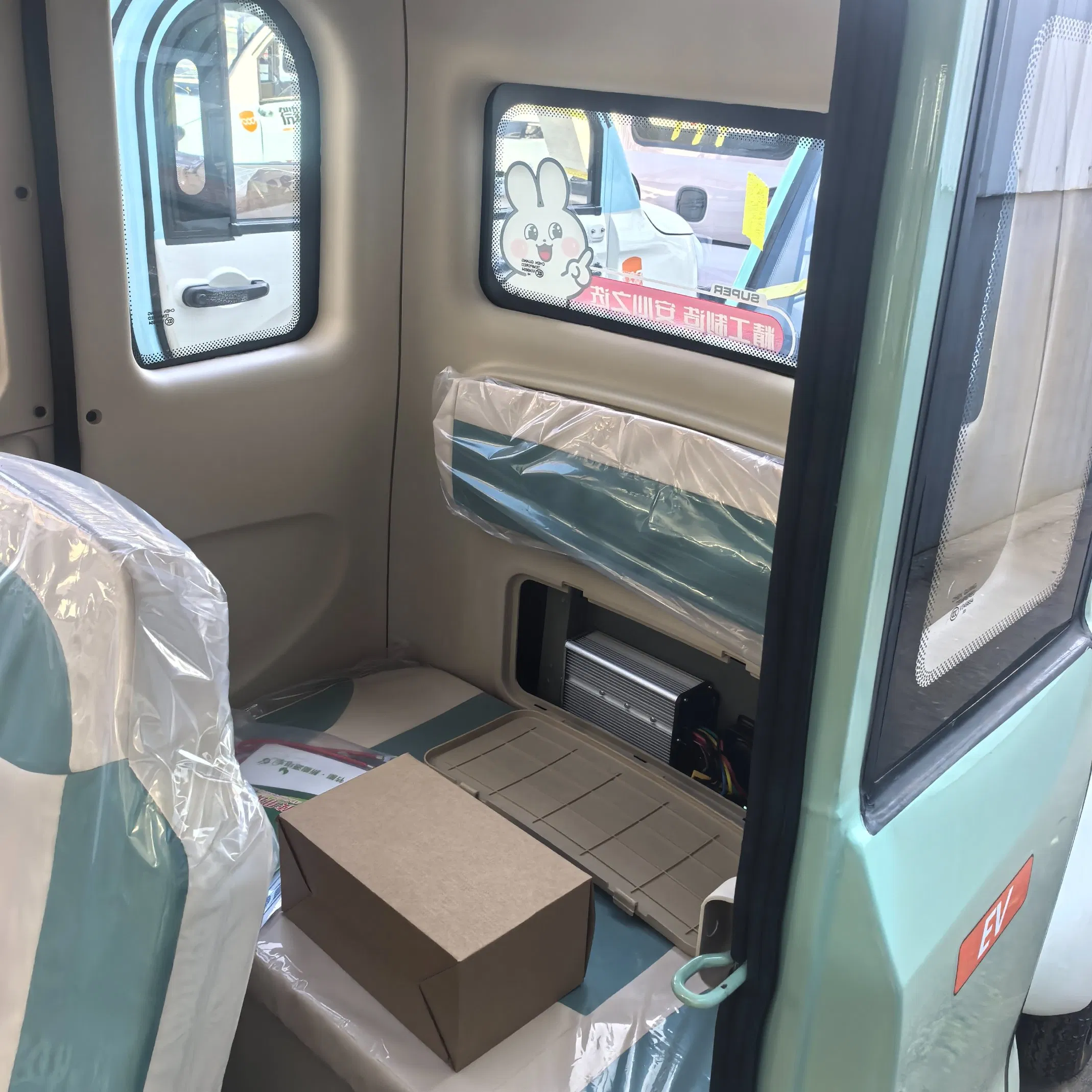 Smart Neighborhood Electric Vehicle with Auto Wiper and Reverse Camera