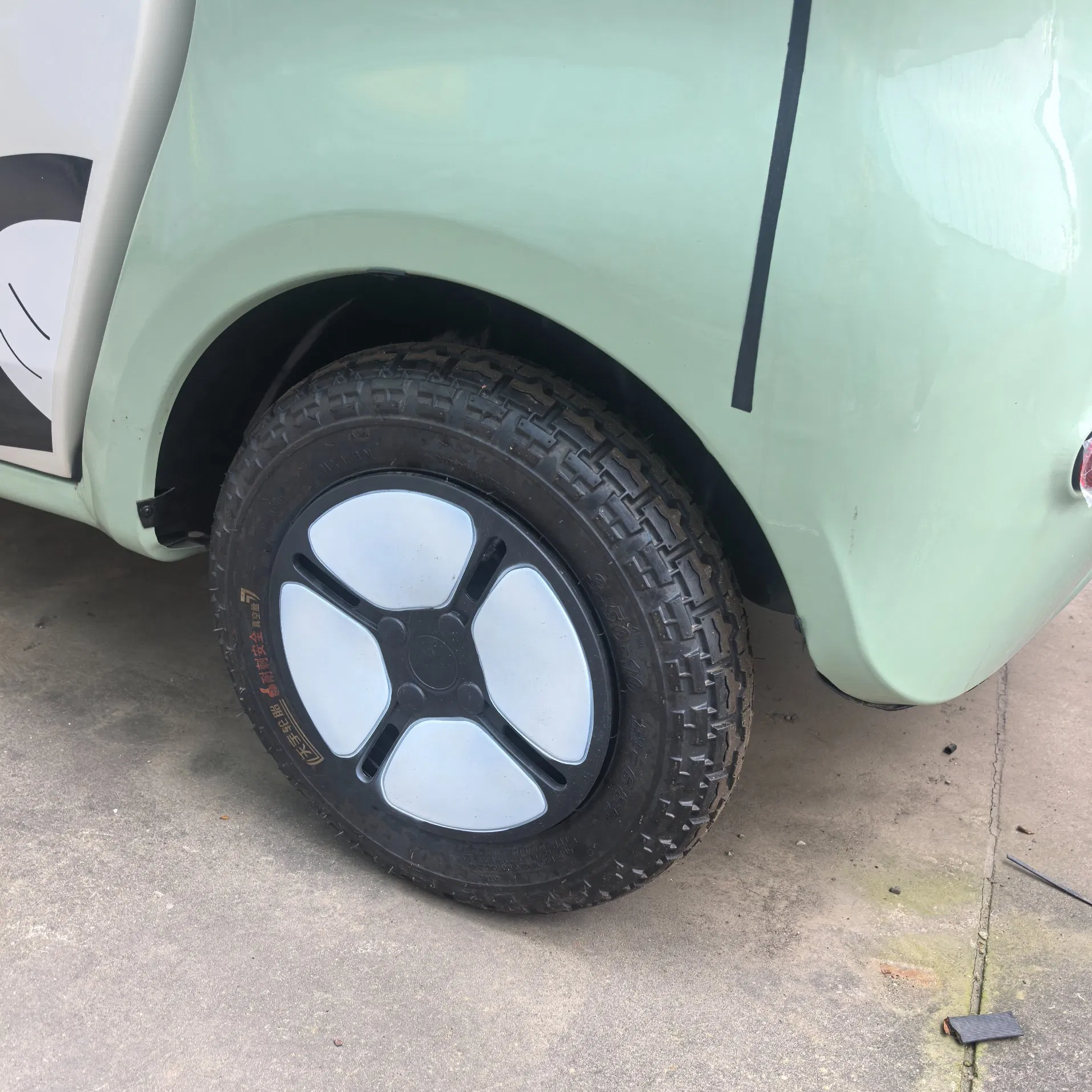 Smart Neighborhood Electric Vehicle with Auto Wiper and Reverse Camera