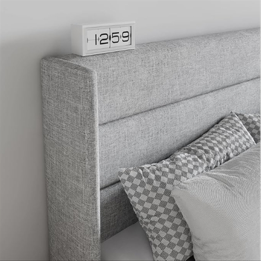 Cama plataforma estofada eficiente em espaço com armazenamento para layouts compactos