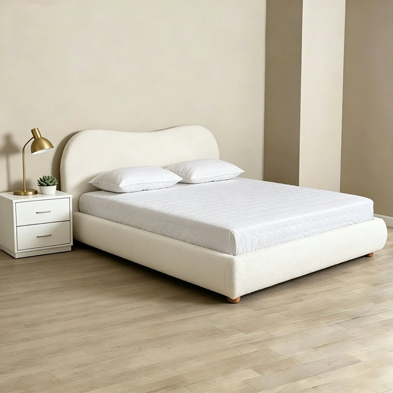 Cama estofada em boucle macio com design de base sólida