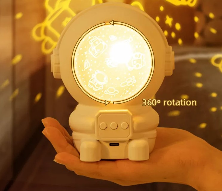 Projetor de Estrelas Rotativo para Crianças com Design de Astronauta