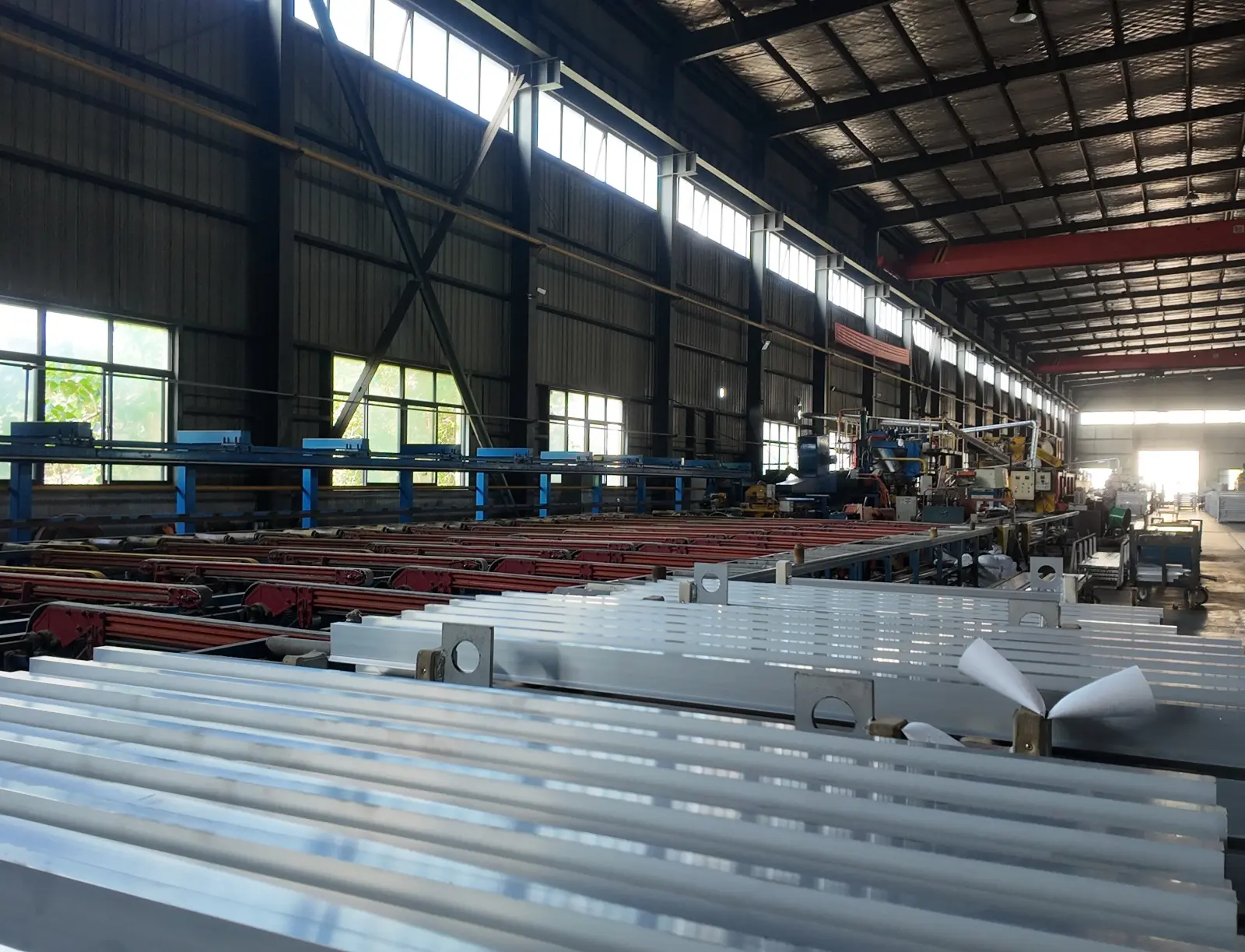 Kangjian aluminum alloy profiles stacked and ready for quality inspection