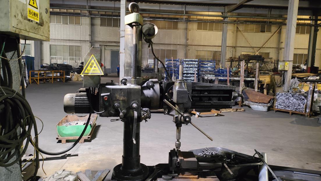 Industrial drilling machine for tool component manufacturing