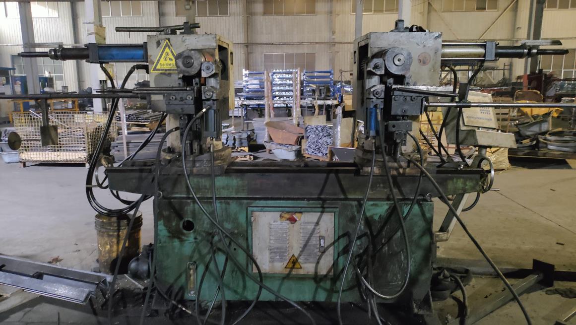 Bending machine for forming and shaping metal tool parts