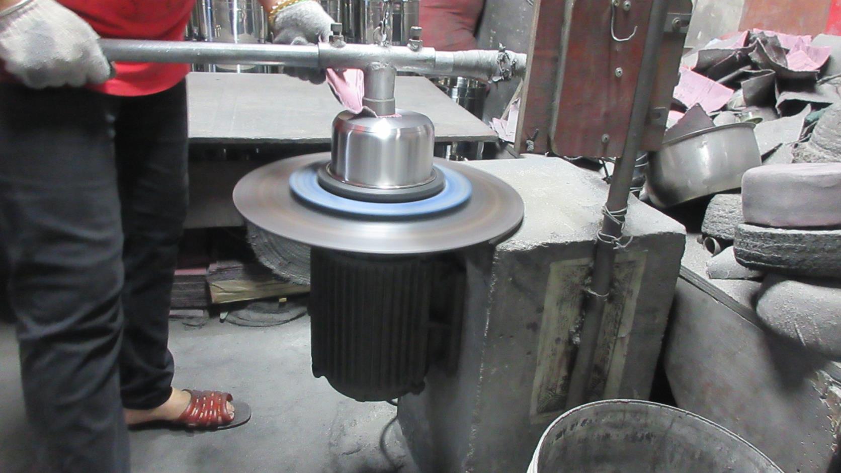 Surface polishing of stainless steel kitchenware for mirror-finish quality at Kaus Kitchen