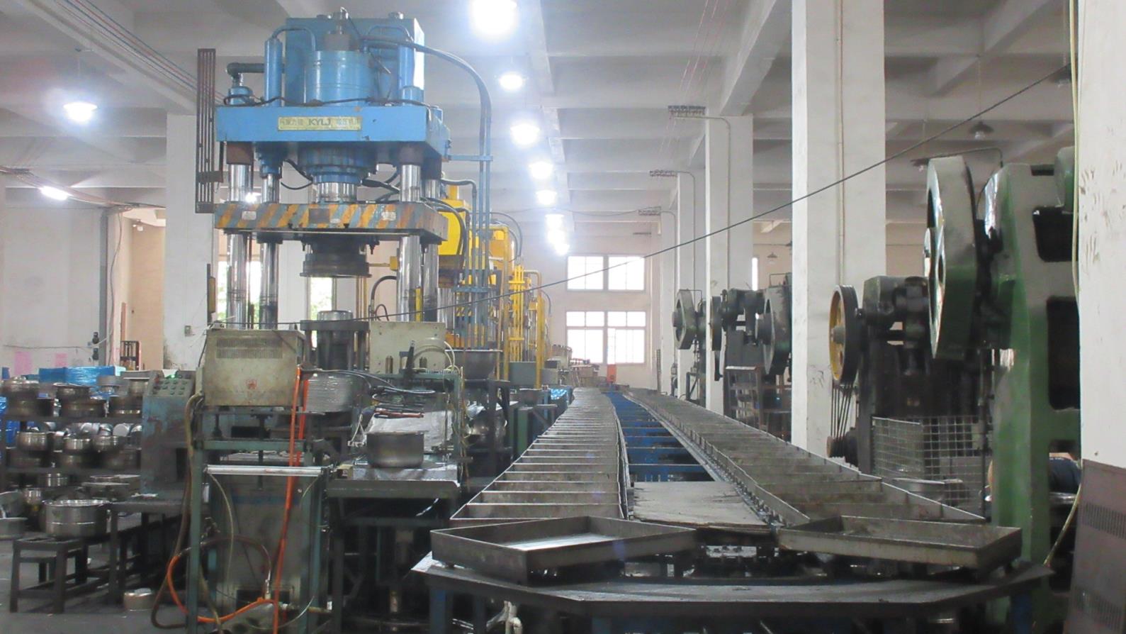 Forming and shaping stainless steel kitchenware products at Kaus Kitchen factory