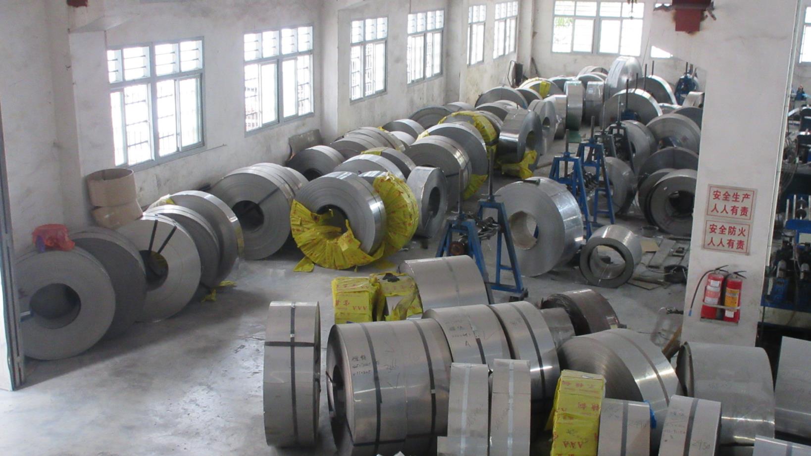 Stainless steel raw material selection and inspection at Kaus Kitchen manufacturing facility
