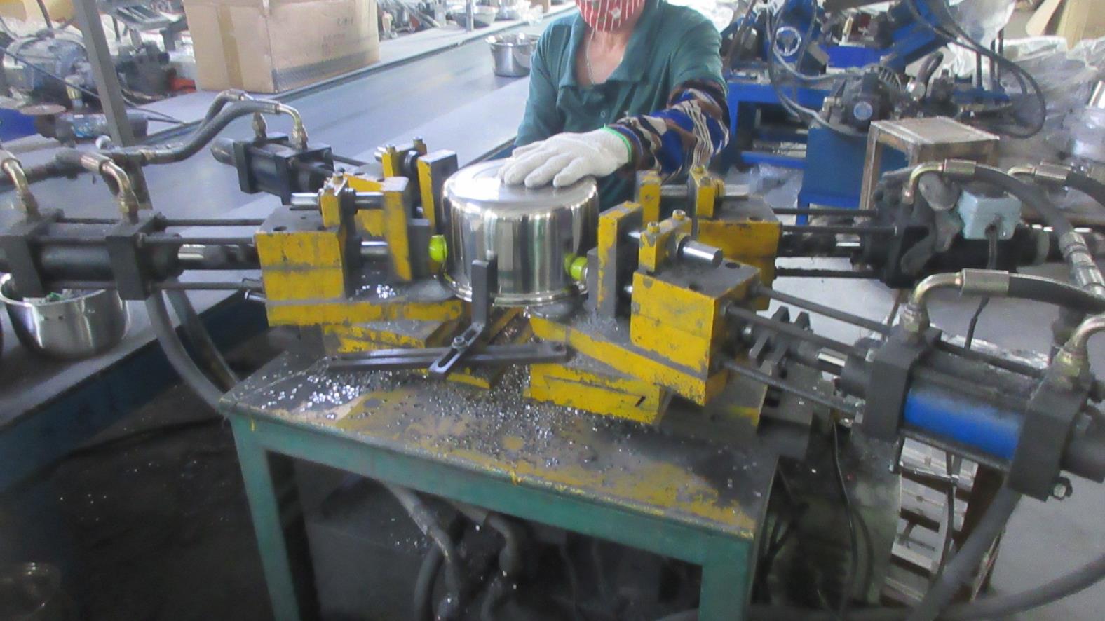 Punching process for stainless steel kitchenware manufacturing at Kaus Kitchen