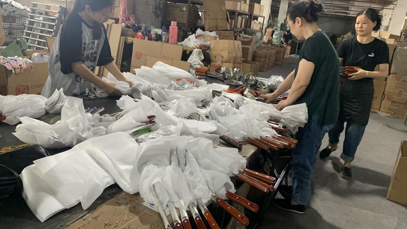 Professional packaging of export kitchenware products at Fergus Kitchen warehouse