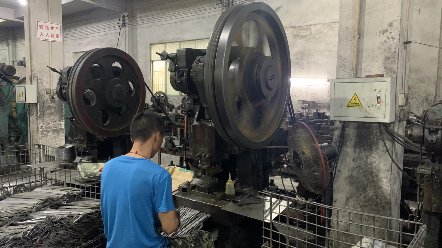 Metal punching process for kitchenware components at Fergus Kitchen