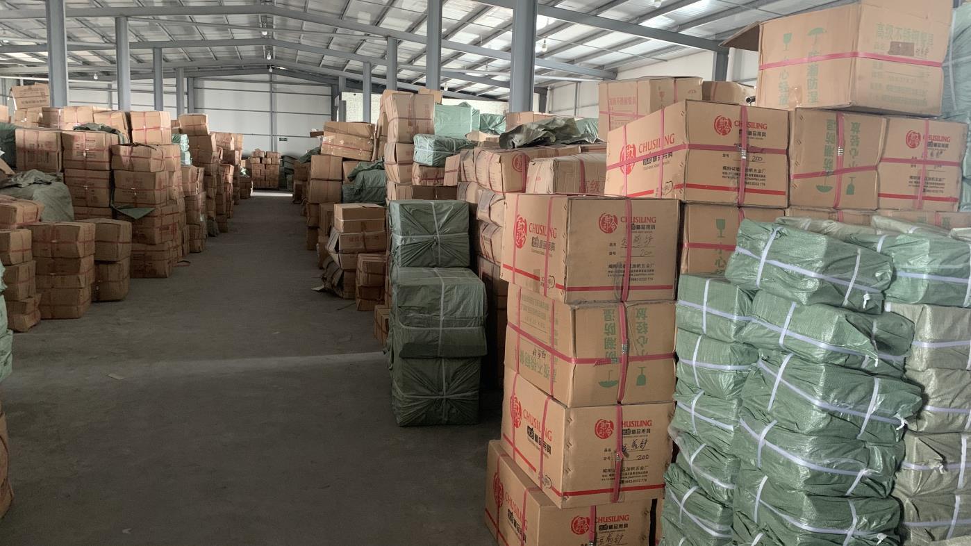 Packing goods in warehouse at Guangdong Fergus Kitchen factory