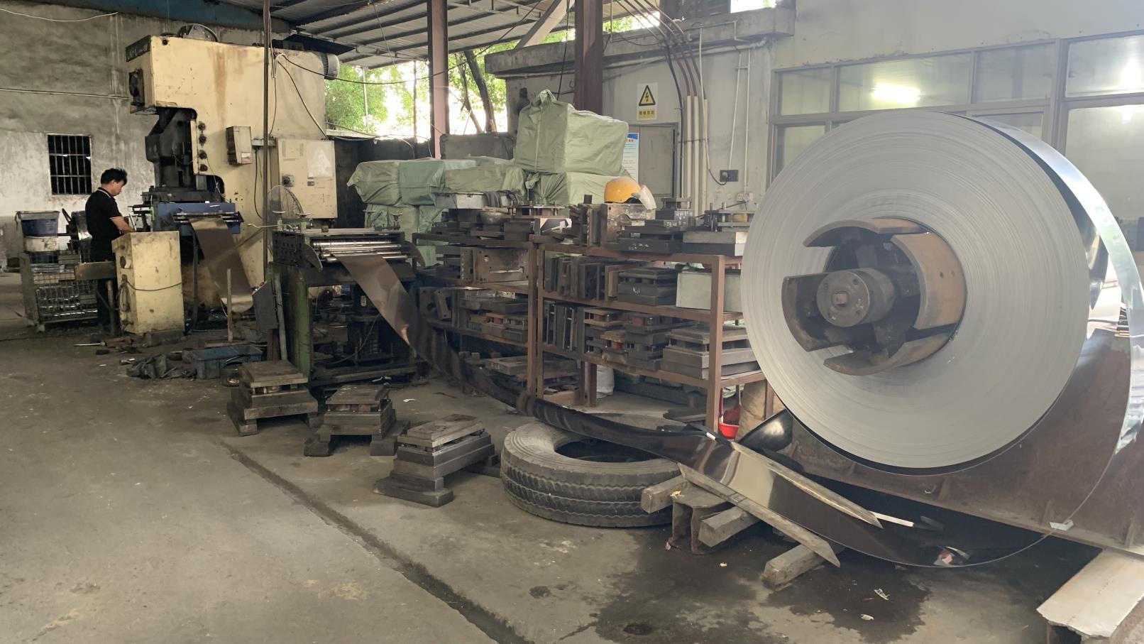 Steel cutting process at Fergus Kitchen manufacturing facility