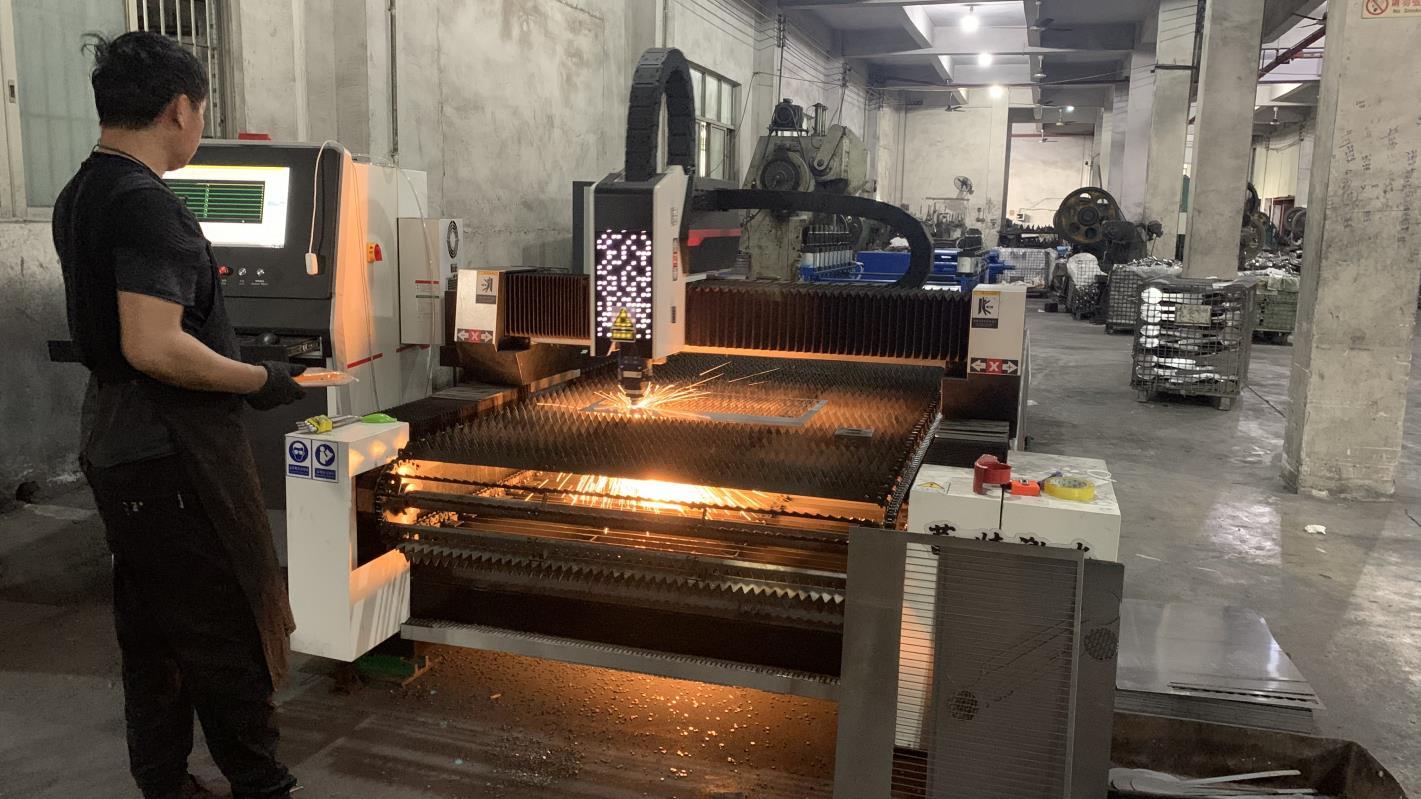 Laser printing of brand logos and markings on kitchenware at Fergus Kitchen