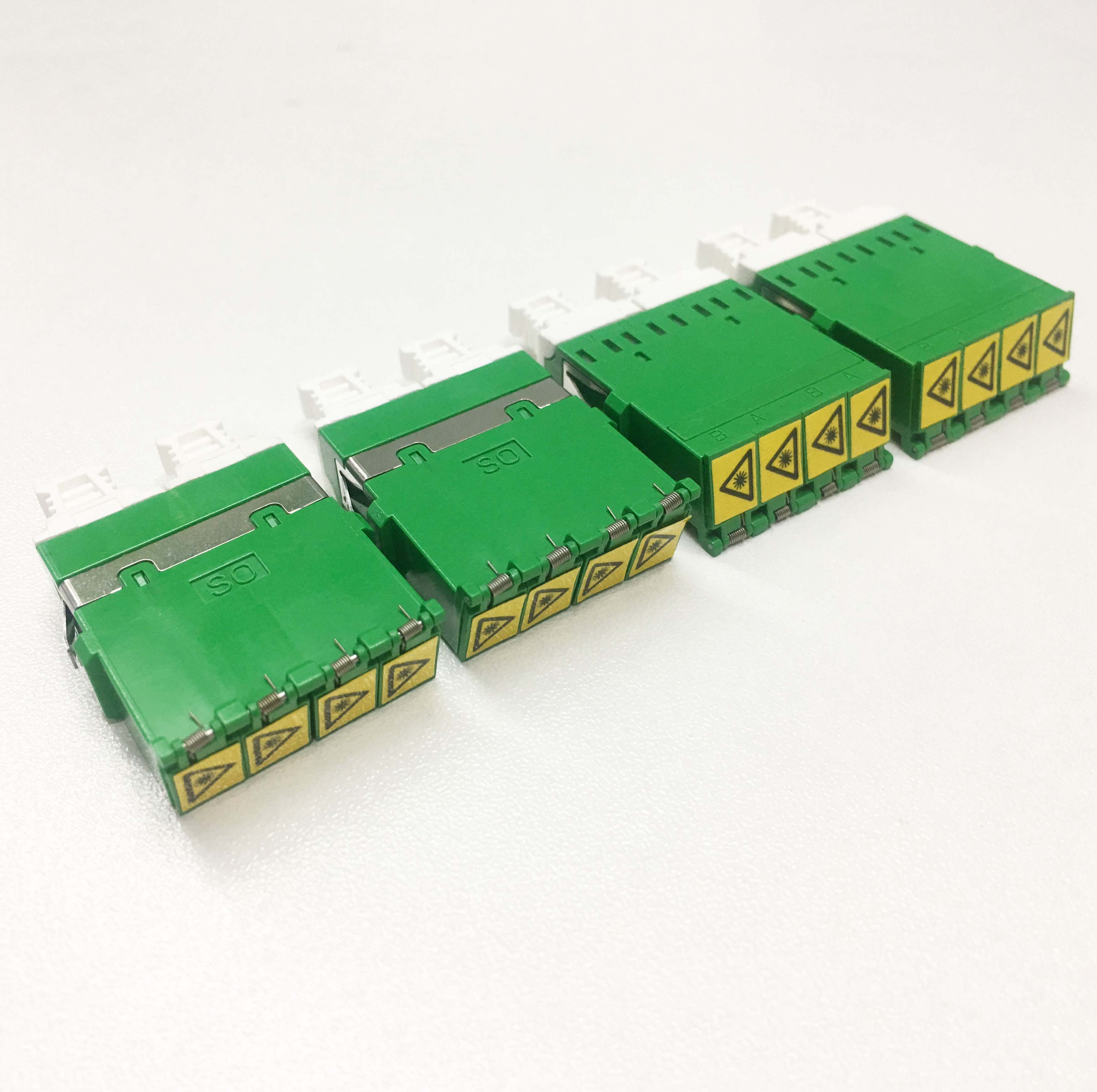 High-Quality No-flange Auto Shutter Cap Green LC to LC APC Quad Fiber Optical Adapter Factory, Quotes
