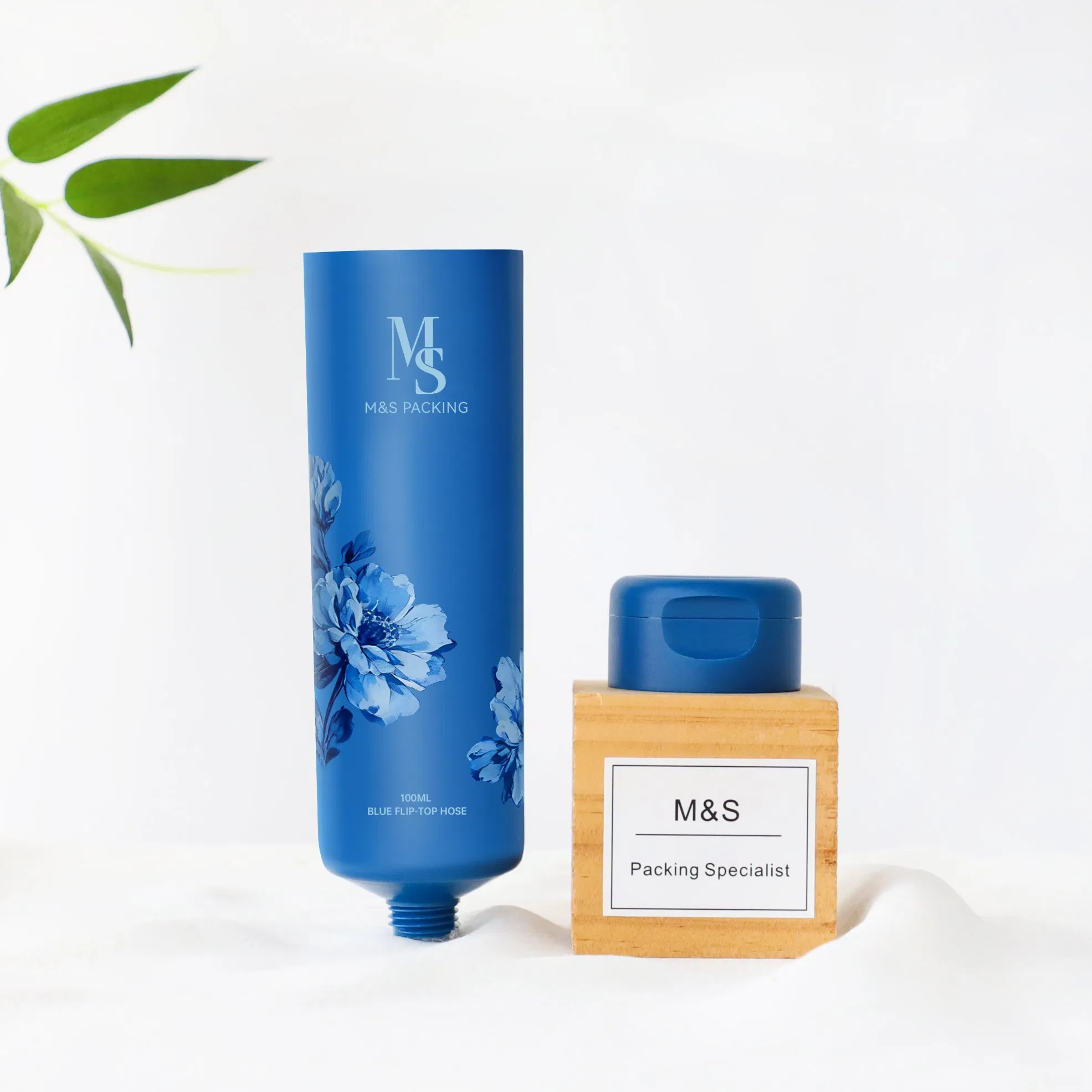 100ml أنبوب مرن قابل للضغط بغطاء أزرق لتعبئة مستحضرات التجميل والعناية بالبشرة