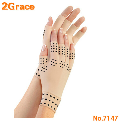 Guantes de compresión magnéticos, elásticos y flexibles con puntos en negro para el soporte de la artritis y alivio del dolor en las articulaciones