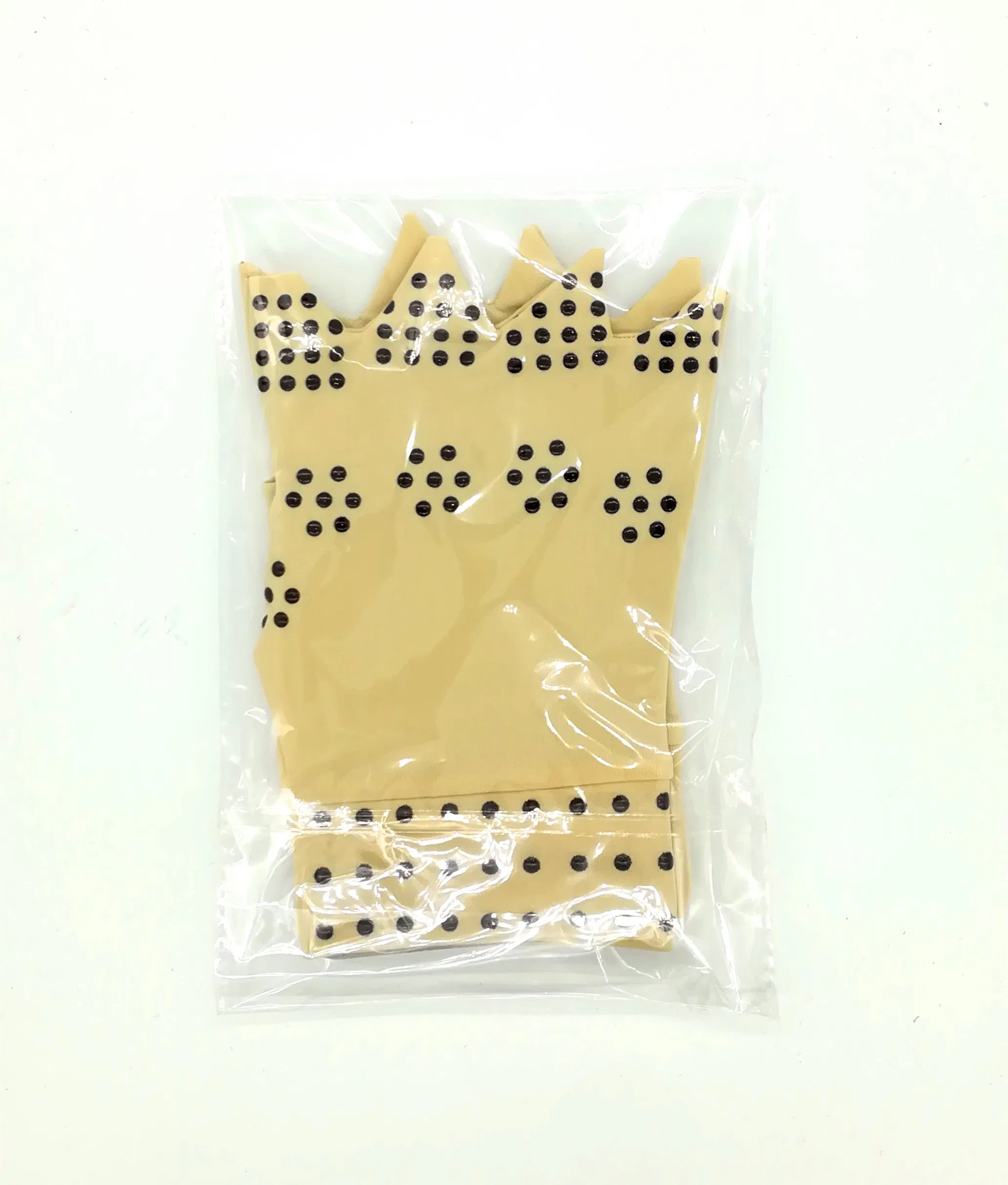 Guantes de compresión magnéticos, elásticos y flexibles con puntos en negro para el soporte de la artritis y alivio del dolor en las articulaciones